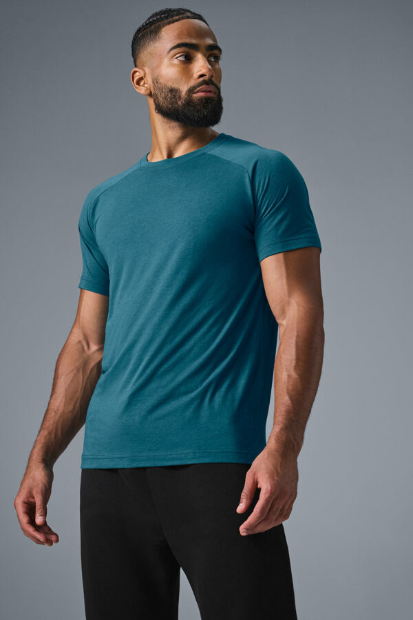 Alo Yoga | The Triumph Crew Neck T-Shirt in Oceanic Teal Blue