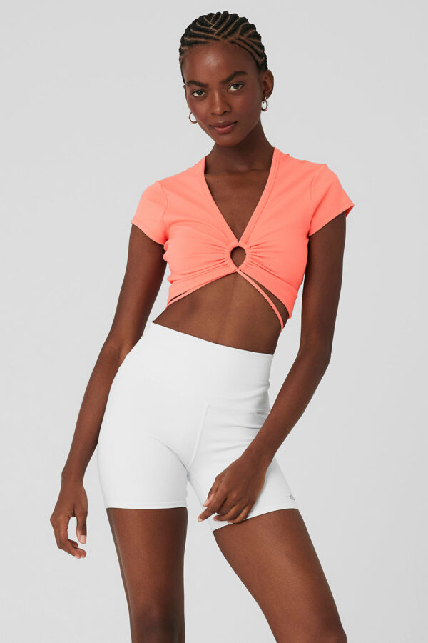 Alo Yoga | Airbrush Criss Cross Short Sleeve Top in Candy Orange Pink